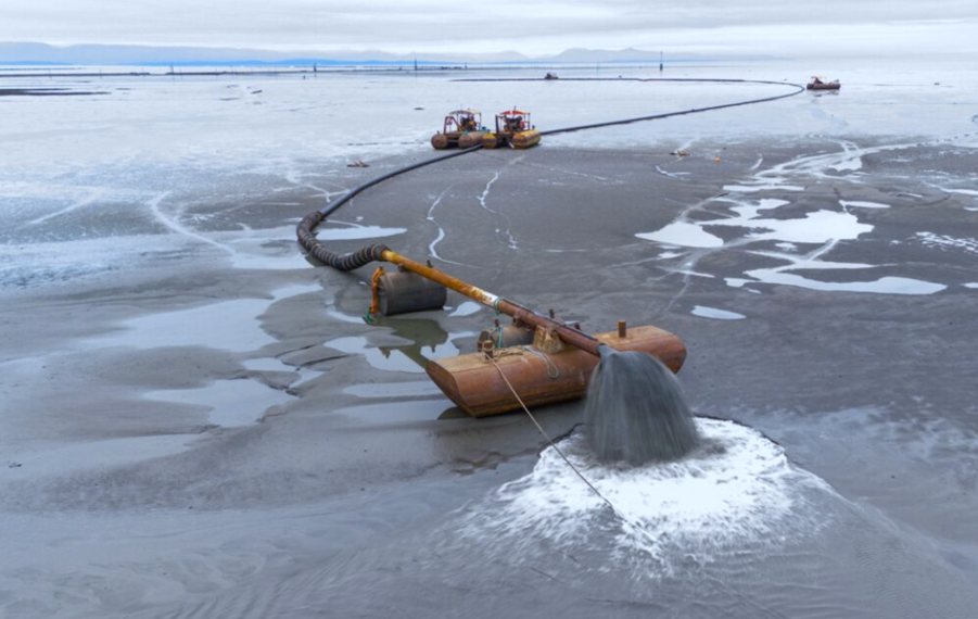 A sediment pipeline discharging onto the tidal flats at Sturgeon Bank