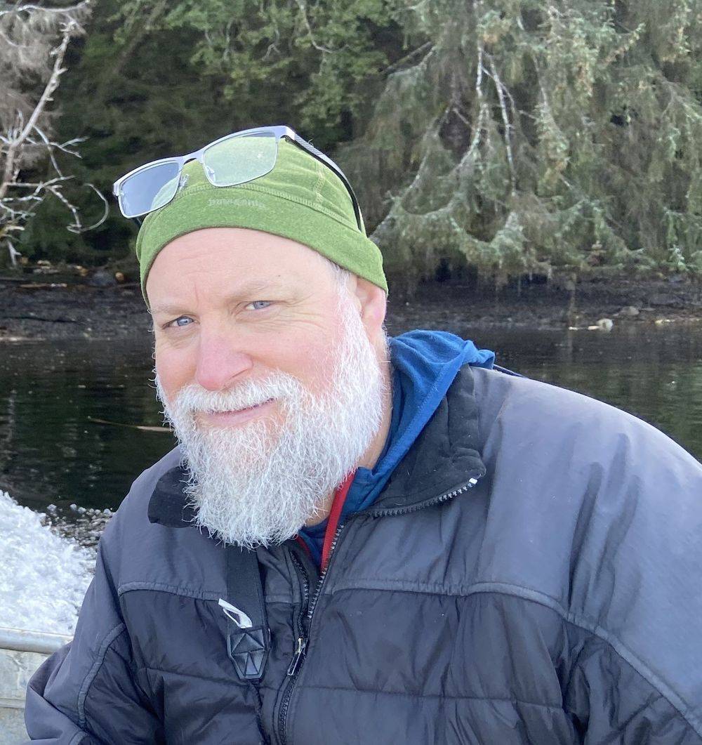 Ben Wheeler outdoors in a green toque